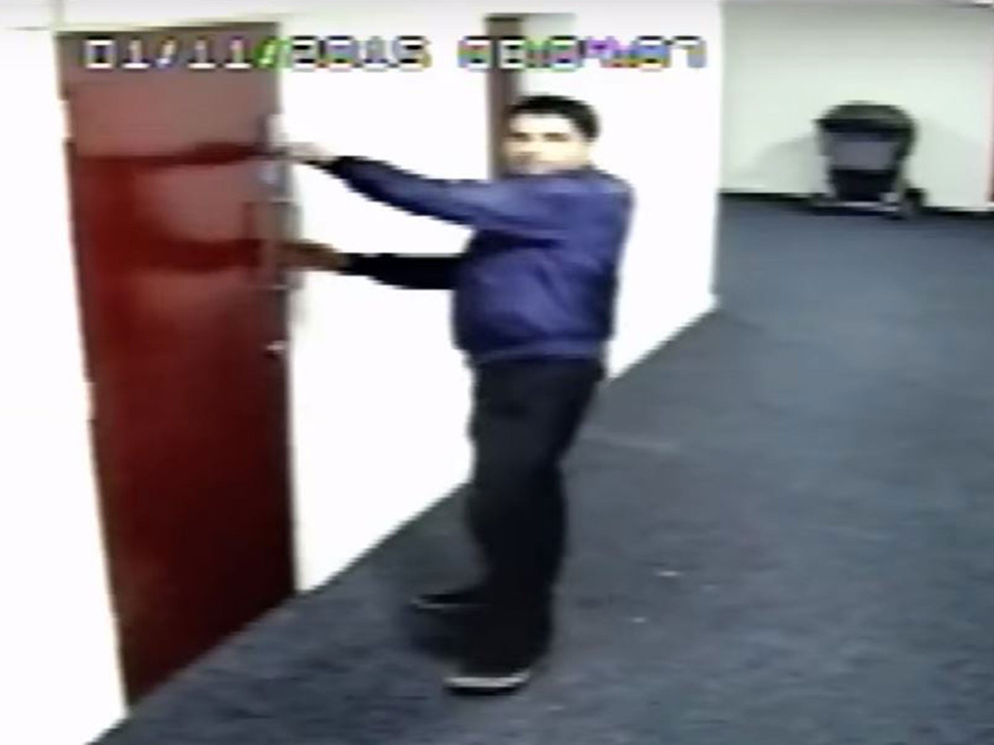 CCTV images of Tahir Nazir, 40, attempting to enter several student flats in New Lawrence House in Hulme, Manchester