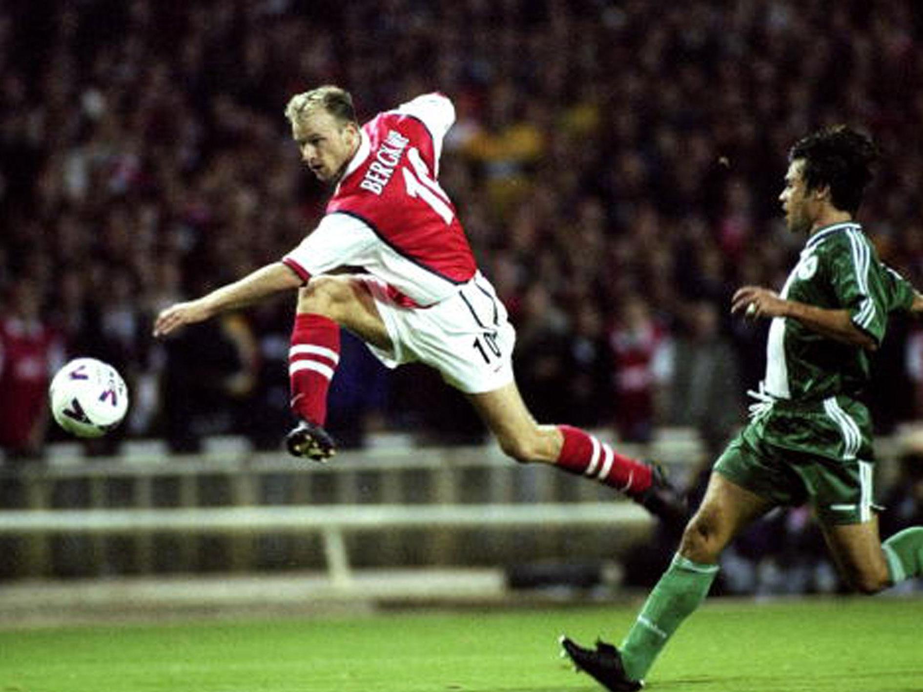 Dennis Bergkamp shoots for goal against Panathinaikos in Arsenal's first Champions League match at the old Wembley in 1998 (Getty)