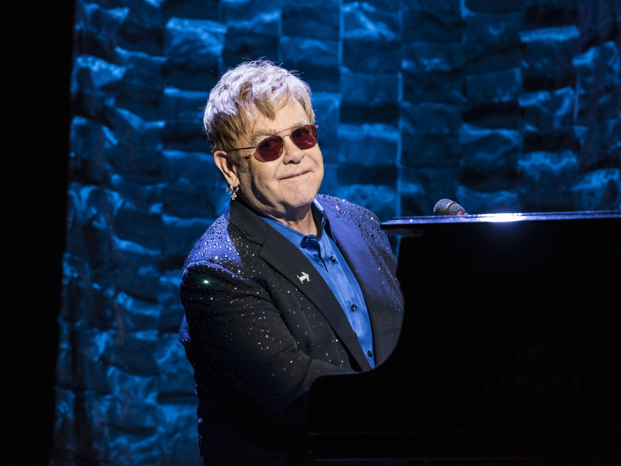 Elton John performs