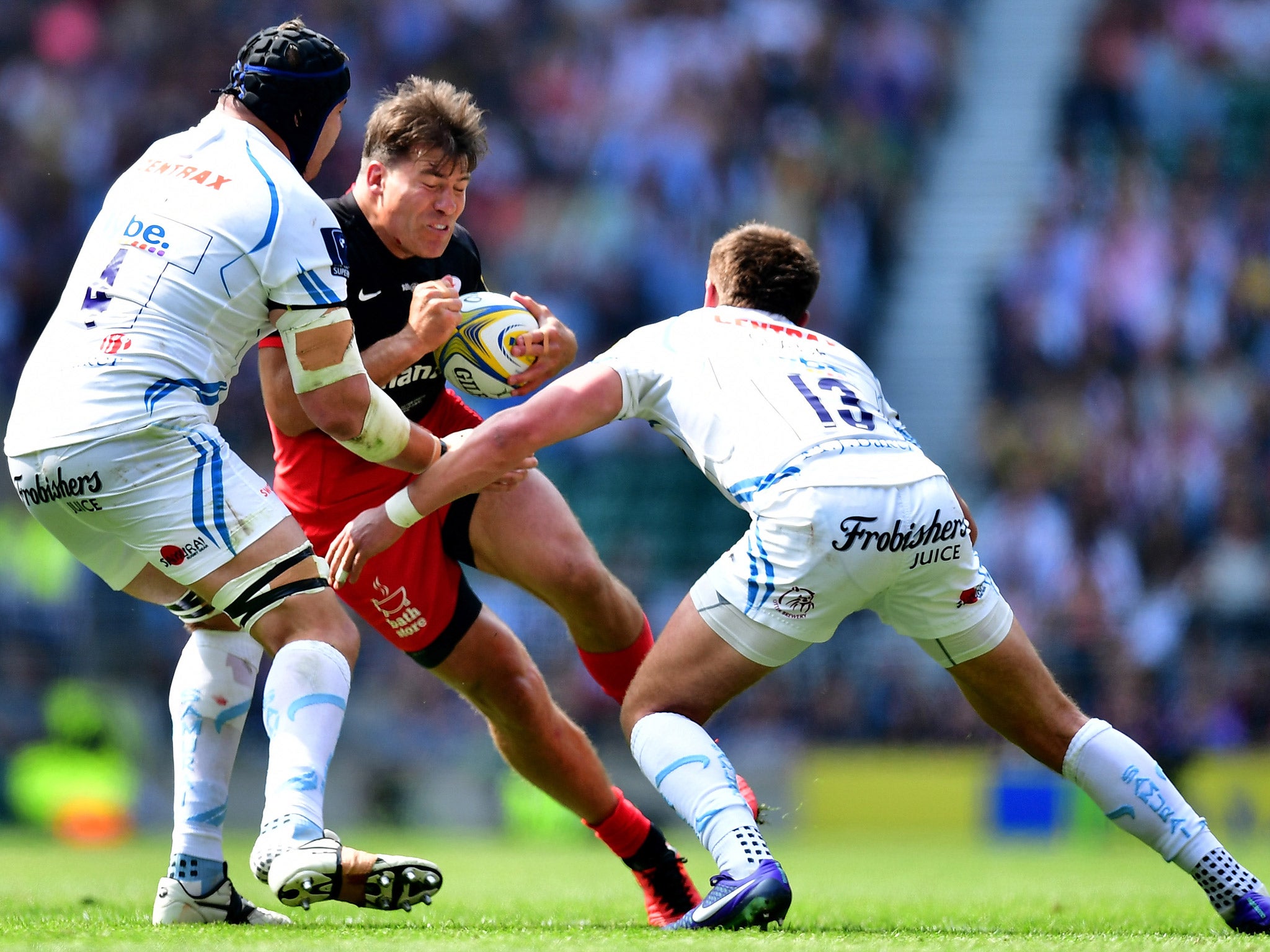 Schalk Brits is tackled by Mitchell Lees and Henry Slade