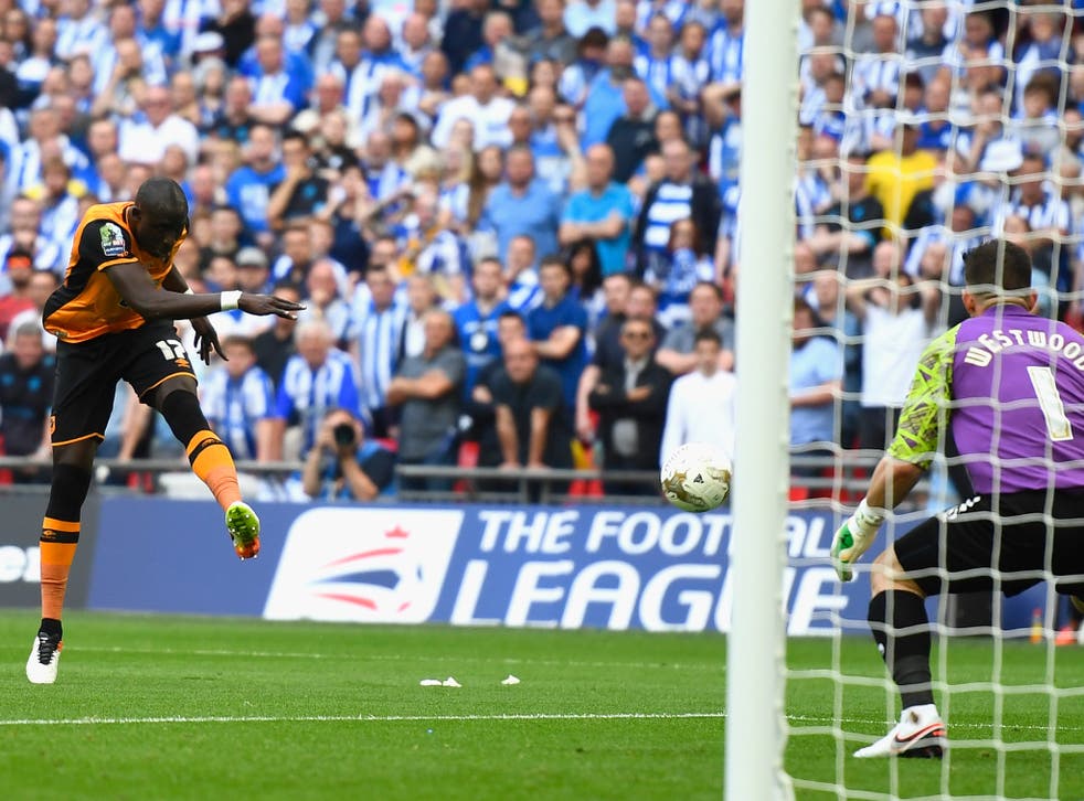 Mohamed Diame has a shot blocked by Sheffield Wednesday goalkeeper Keiren Westwood