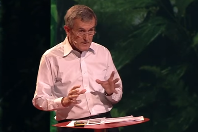 Neil MacGregor speaking at a TED talk in 2012