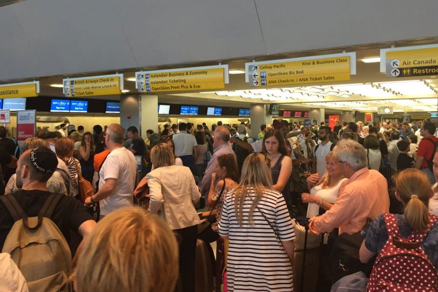 An estimated 1,500 passengers were queuing to check in at one point