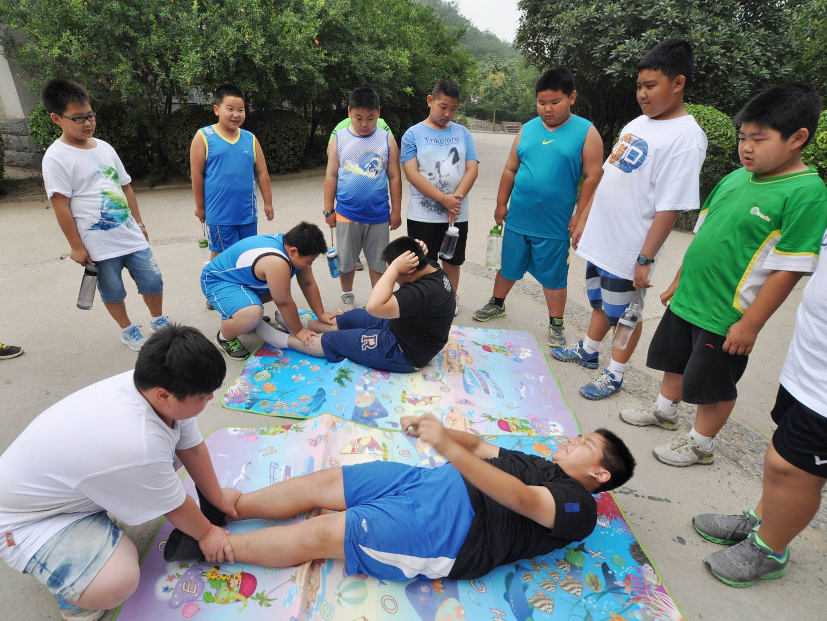 Children in China are being sent to weight-loss summer camps such as this one in hengzhou city, central China's Henan Province