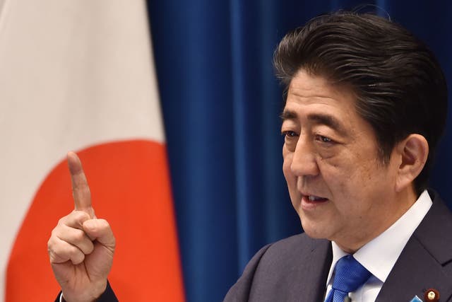 Abe said he would delay a consumption tax hike that threatened to derail the fragile economy, but analysts said it highlighted the failure of his years-long efforts to spark growth