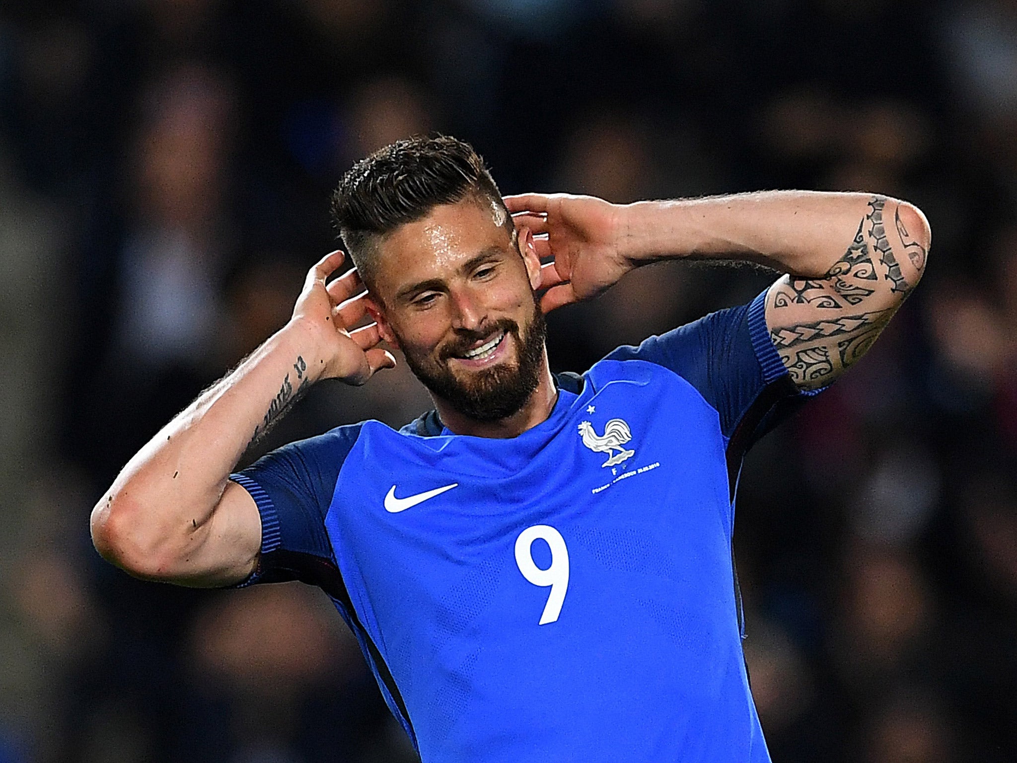 Olivier Giroud believes he is being booed because of Karim Benzema being left out of the France squad