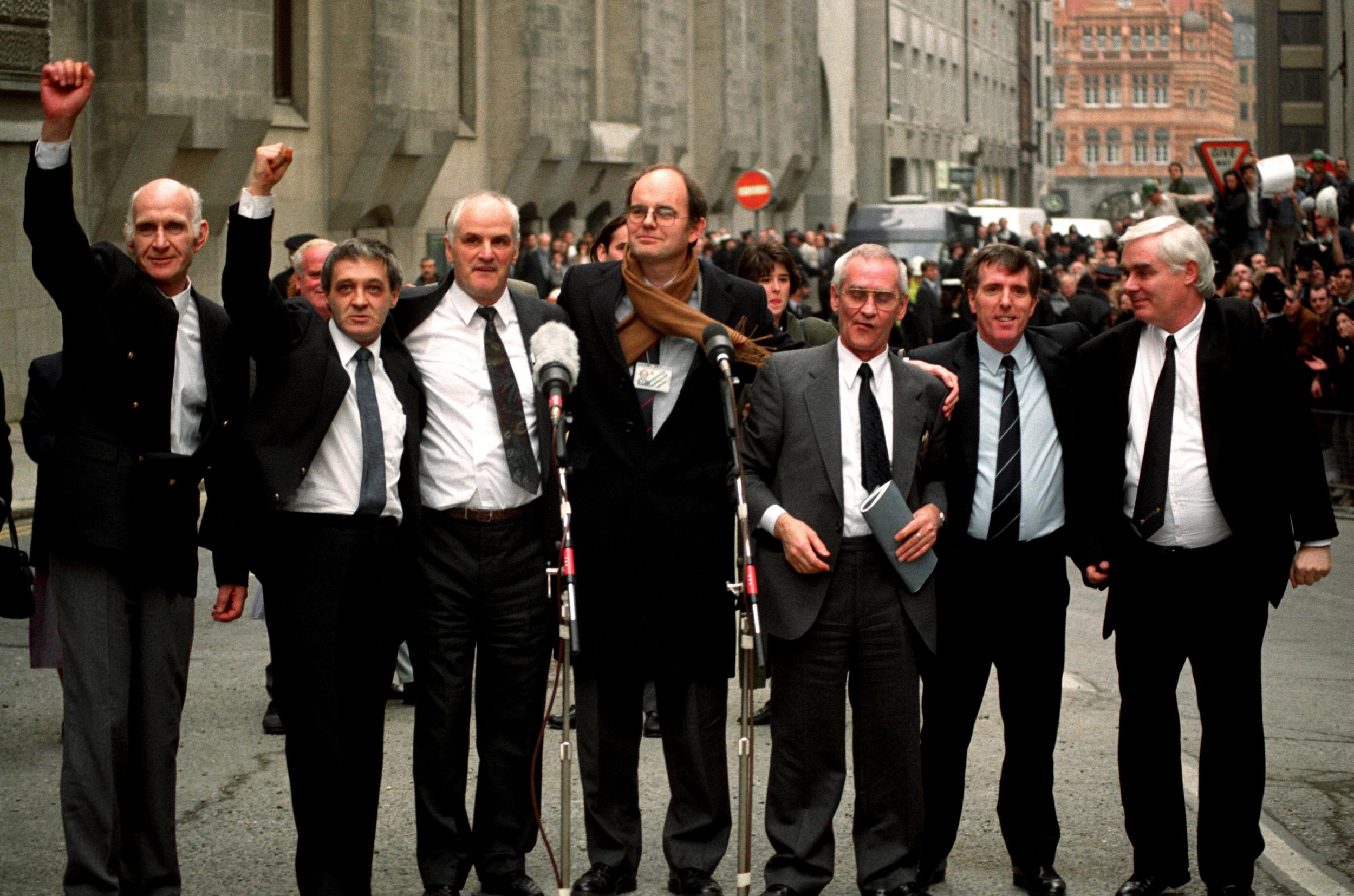 Birmingham Six outside the Old Bailey in London, with Chris Mullen MP (centre), after their convictions were quashed: (left to right) John Walker, Paddy Hill, Hugh Callaghan, Richard McIlkenny, Gerry Hunter and William Power