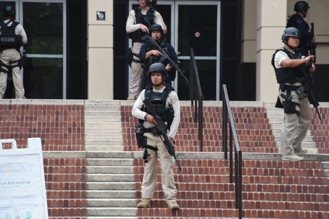 Members of security at the University of California's Los Angeles campus following the shooting