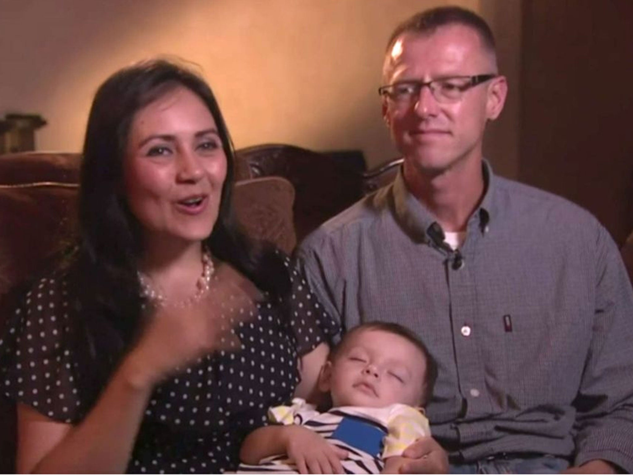 Richard Cushworth and his Salvadoran wife Mercedes Casanellas with their baby son Moses who was originally swapped at birth in El Salvador
