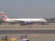 Police surround British Airways plane after 'bomb threat' warning