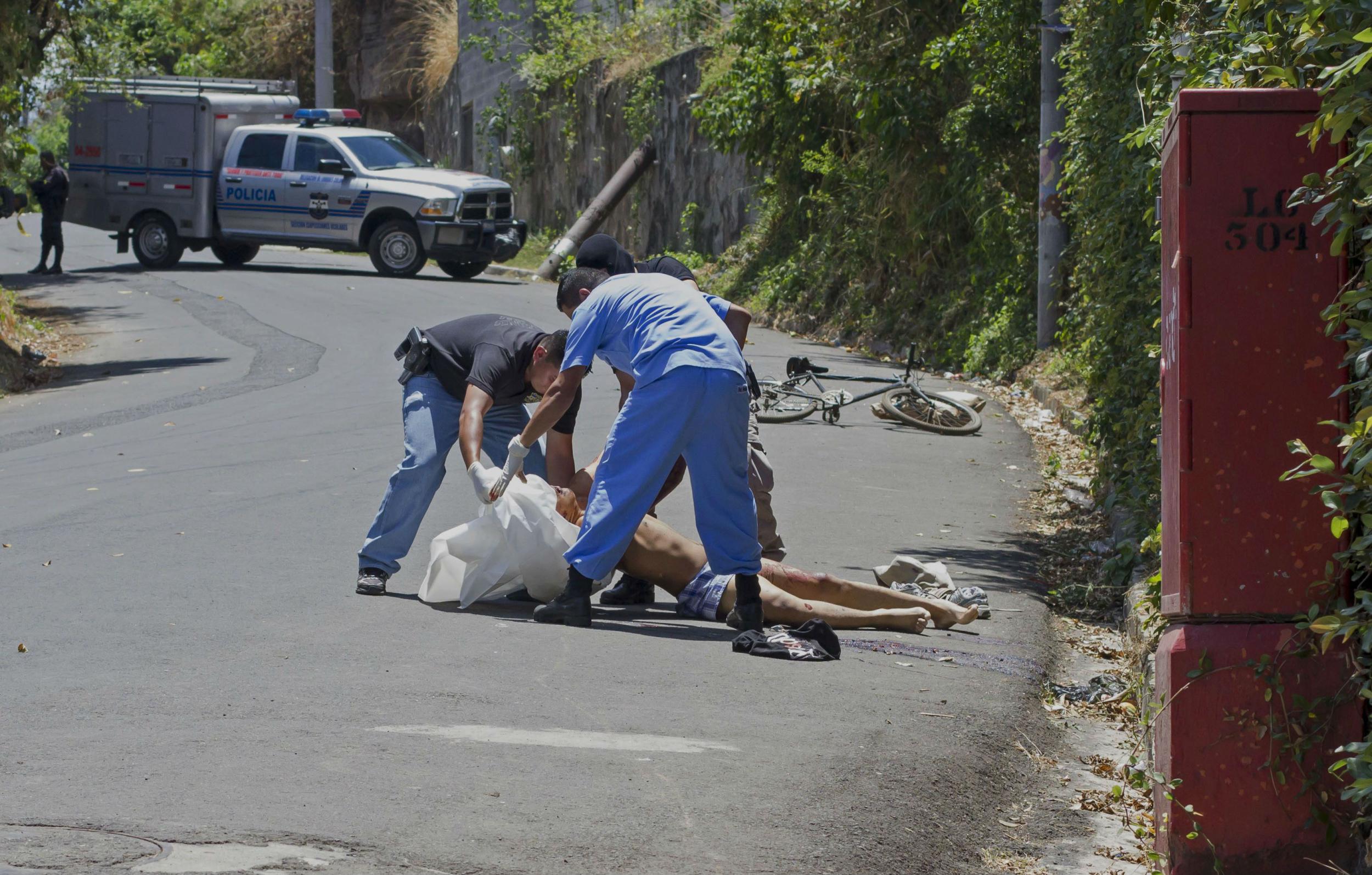 Teams work 24-7 to collect bodies that are dumped in the street