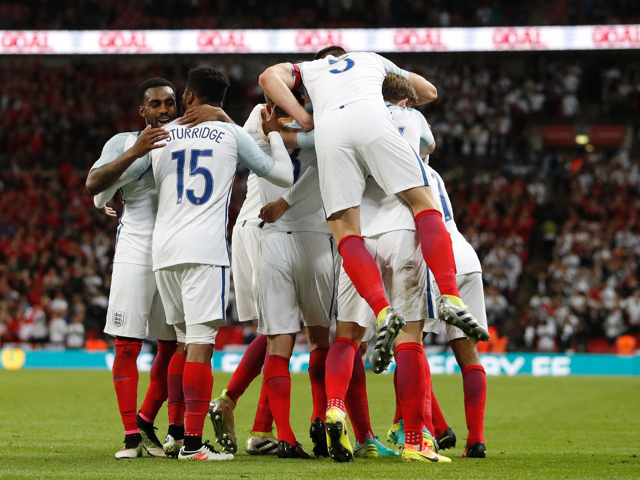 Chris Smalling is mobbed his his England team-mates