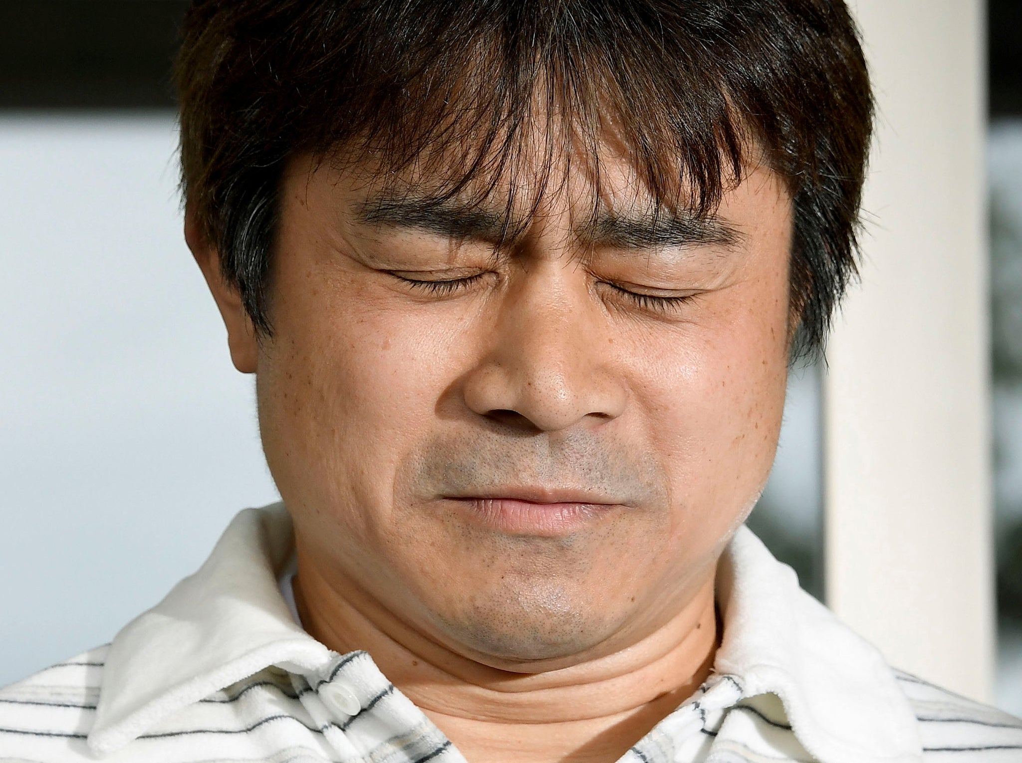 Takayuki Tanooka, father of 7-year-old boy Yamato Tanooka who went missing