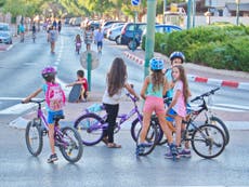 Ultra-orthodox Israeli rabbi bans girls over five from riding bikes because it is 'provocative'