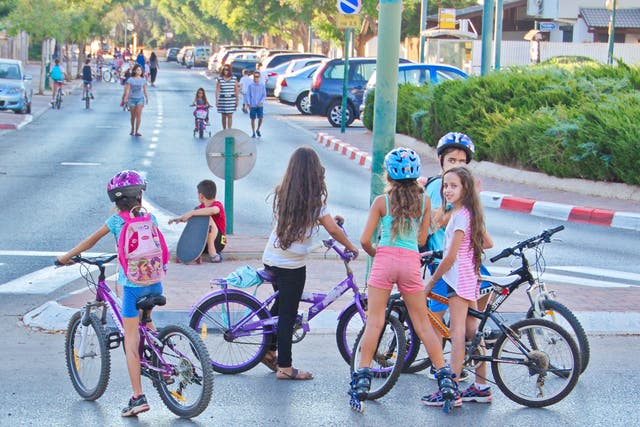 Young girls riding bikes in Israel (file pic)