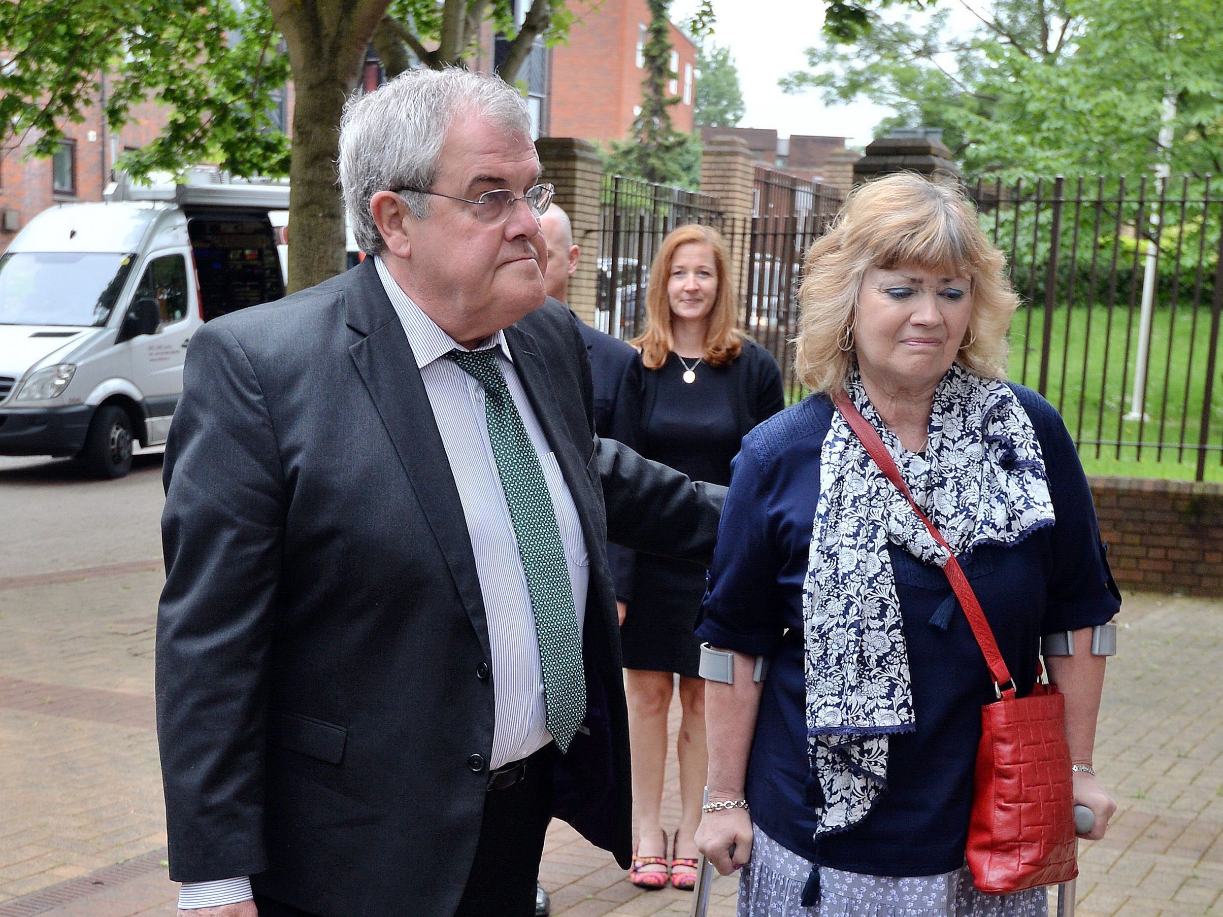 Des and Doreen James, parents of Private Cheryl James, arrive at Woking Coroner's Court in Surrey