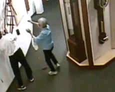 Museum CCTV captures moment man breaks rare wooden clock by accidentally knocking it off wall