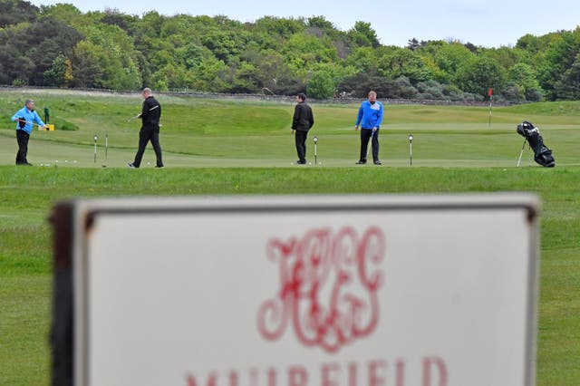 Golfers play at Muirfield Golf Club Gullane, Scotland