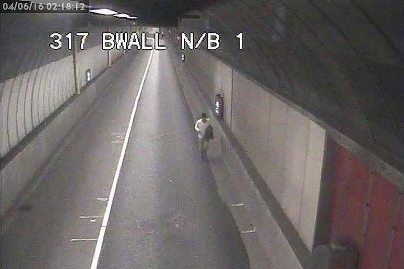 Man running through Blackwall Tunnel