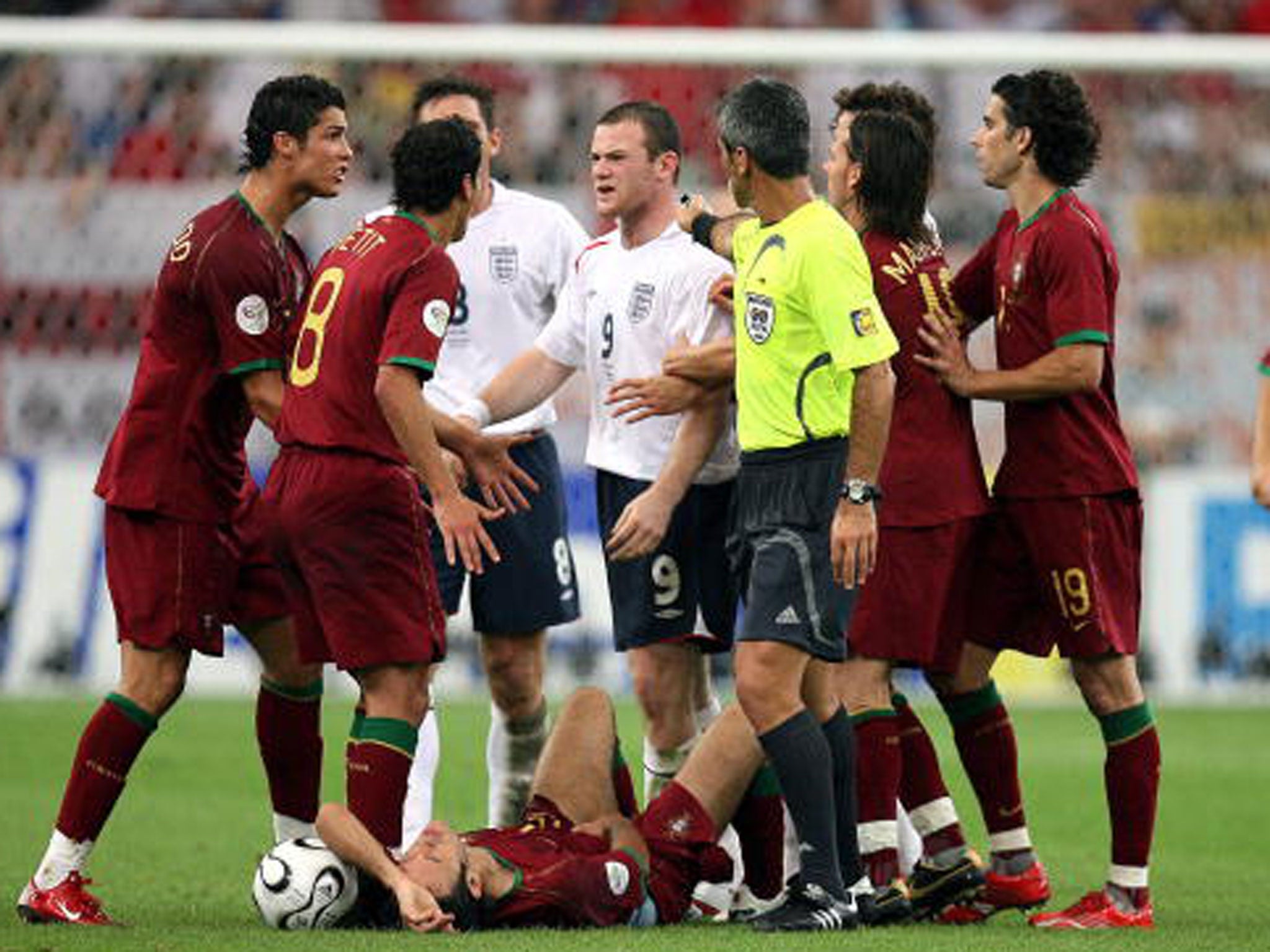 Cristiano Ronaldo implores the referee to send Wayne Rooney off during the 2006 World Cup (Getty)