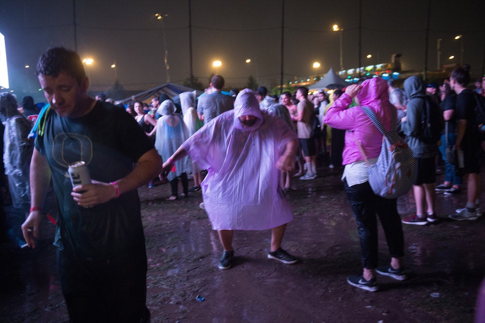 People getting down in the rain at Governors Ball 2016.