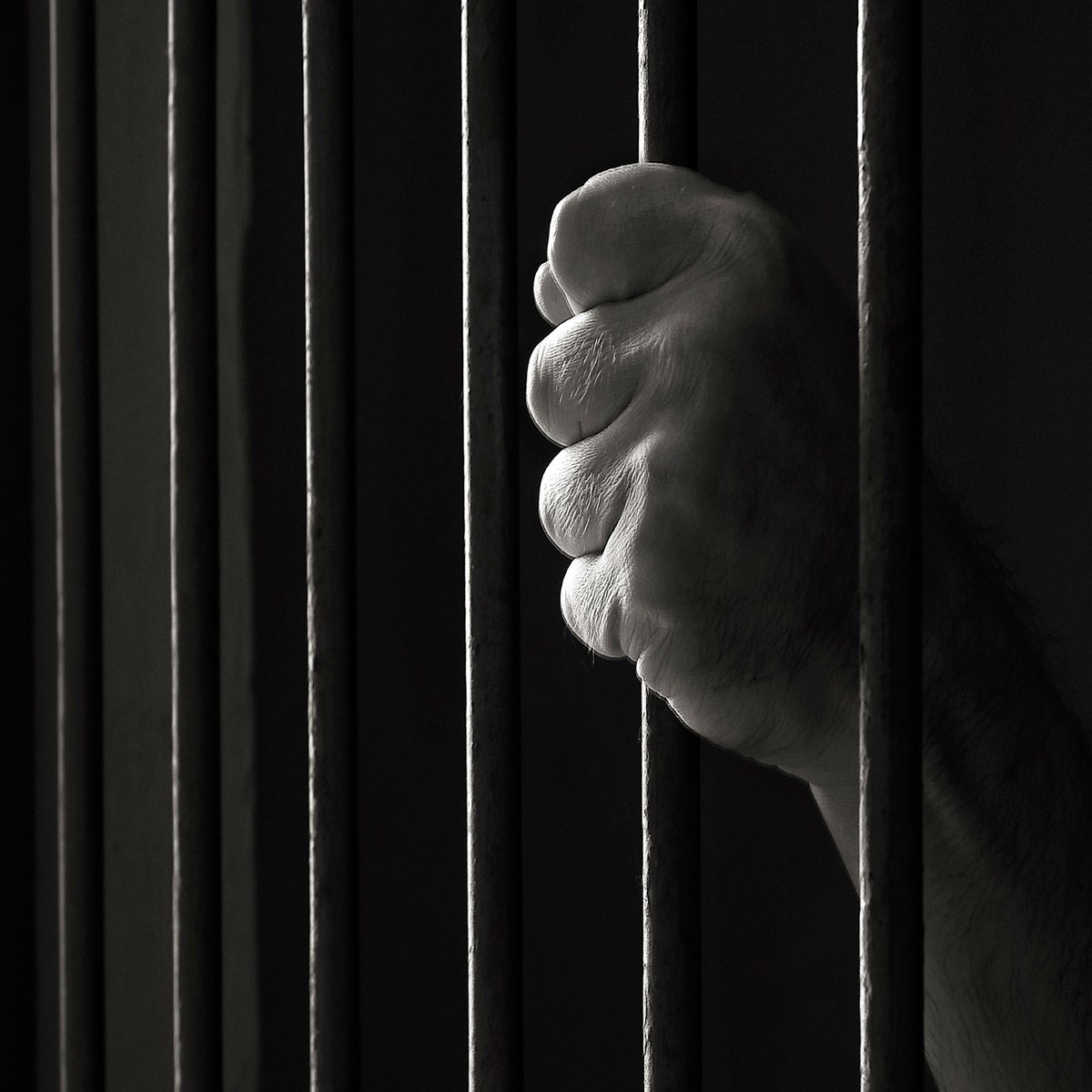 black prisoners behind bars