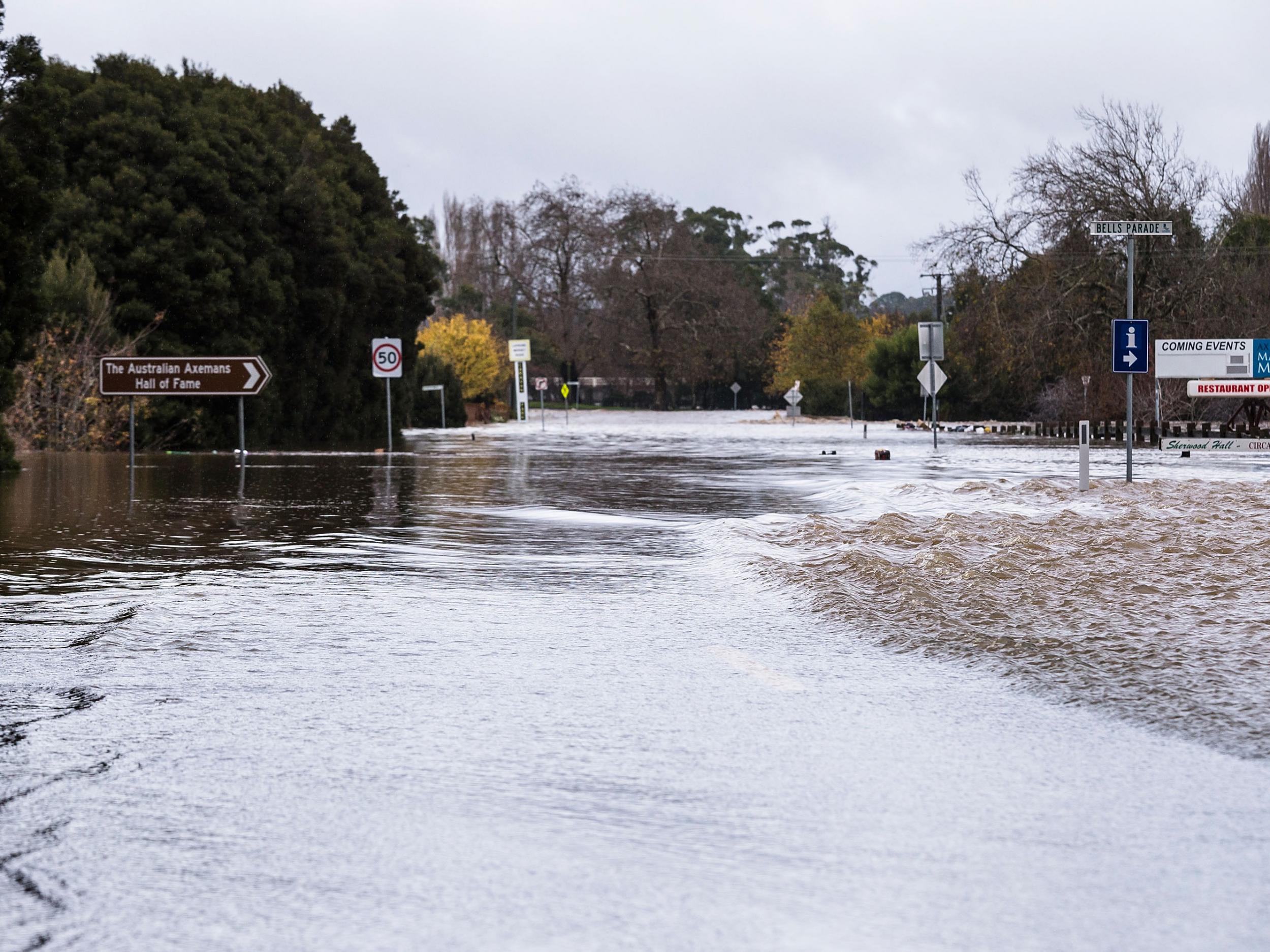 The Mersey River breaks its banks and floods several nearby towns (Getty Images )