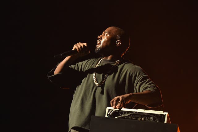 Kanye West performs at the 2015 iHeartRadio Music Festival.