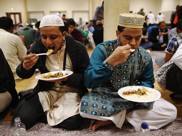 Muslims break their fast at East London Mosque on the last day of Ramadan