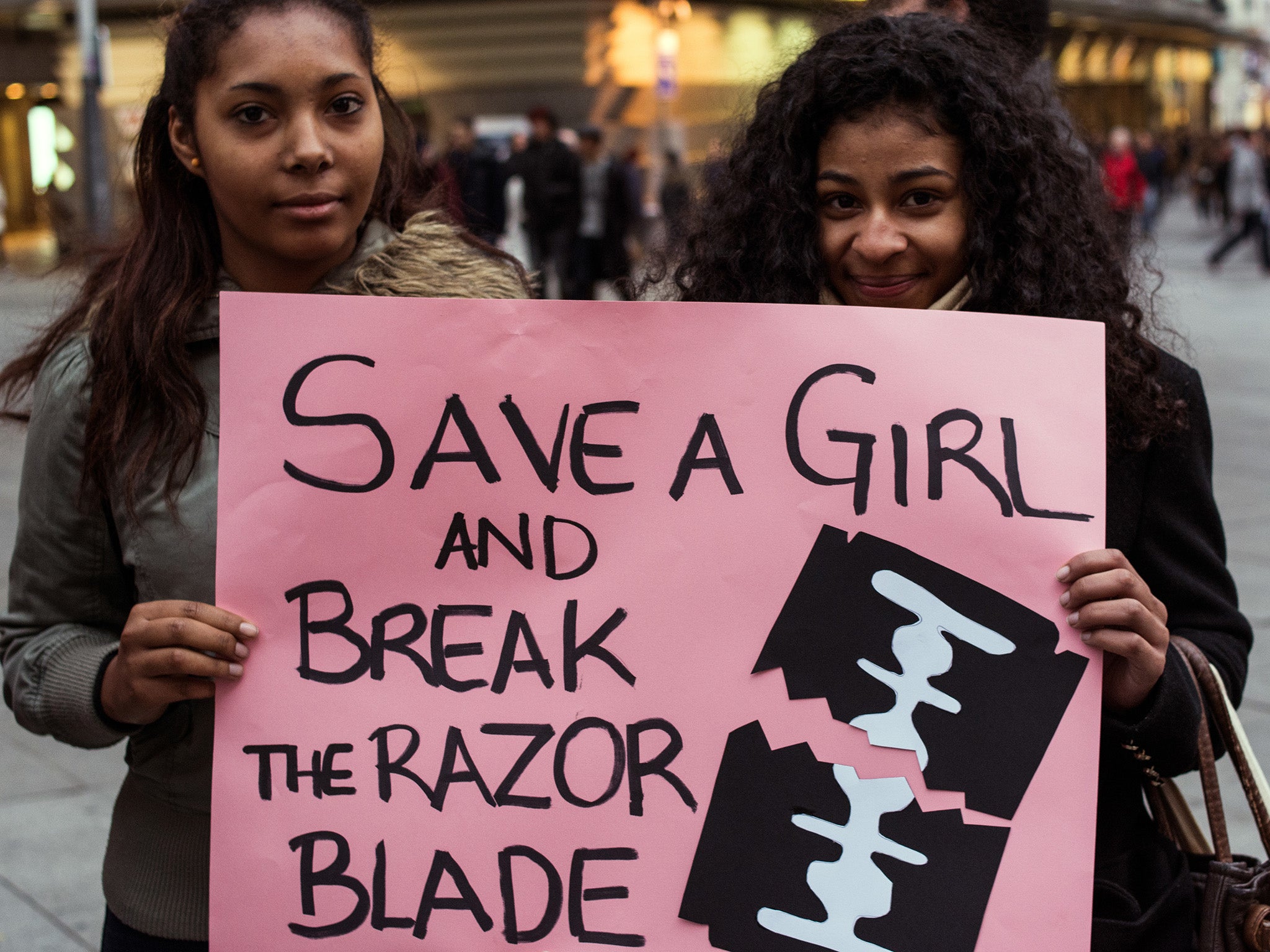 Woman protesting on the International Day Against FGM