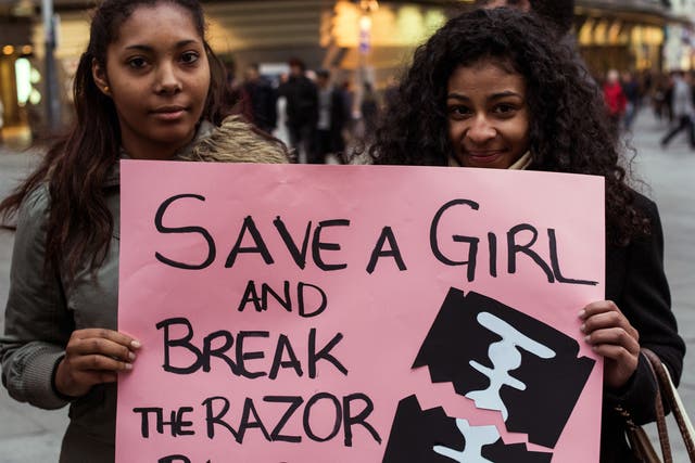 Women protesting during the International Day against female genital mutilation