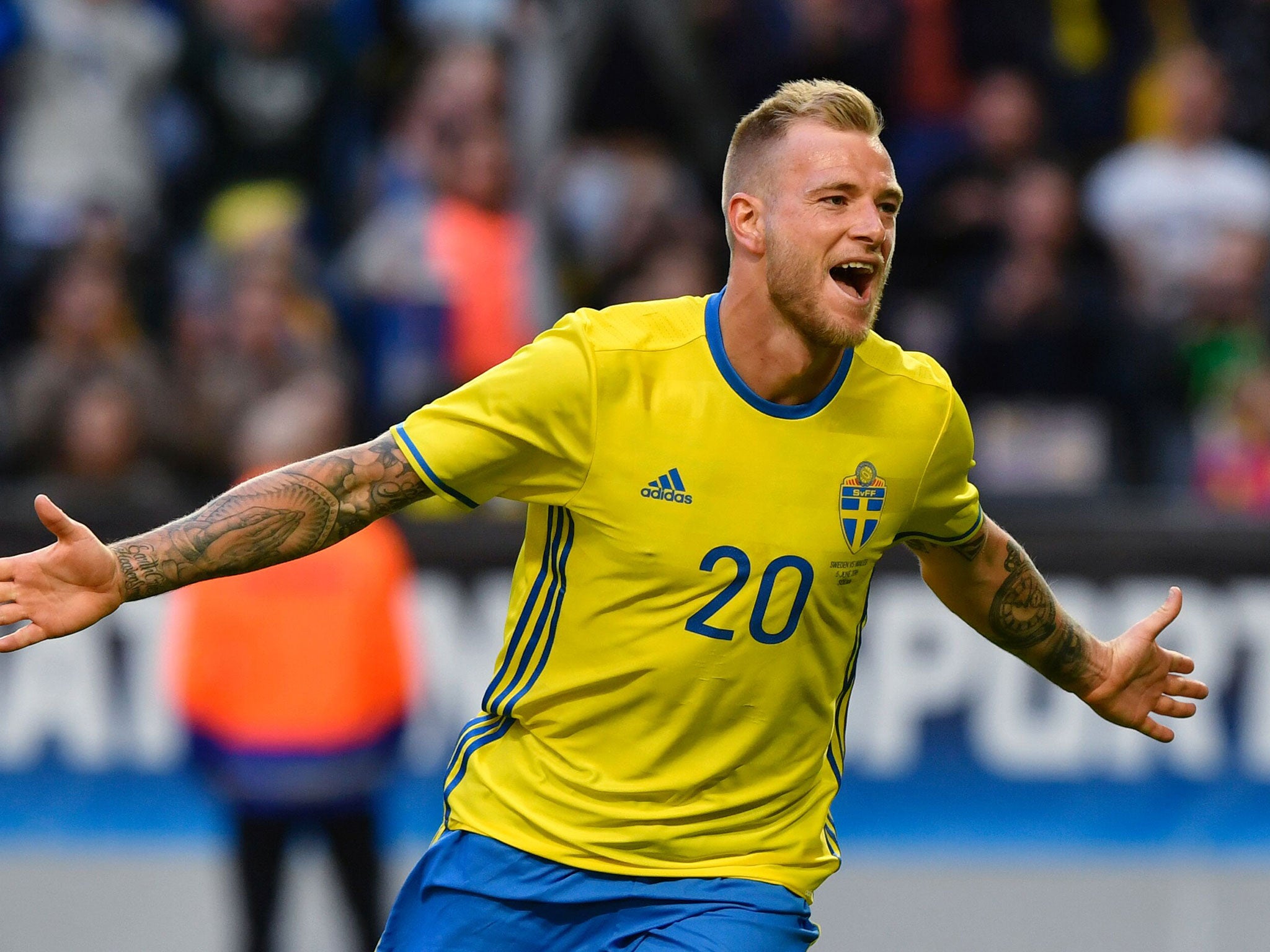 John Guidetti, who spent seven years at Manchester City, celebrates scoring for Sweden