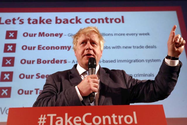 Boris Johnson talks to supporters during a Vote Leave rally in London