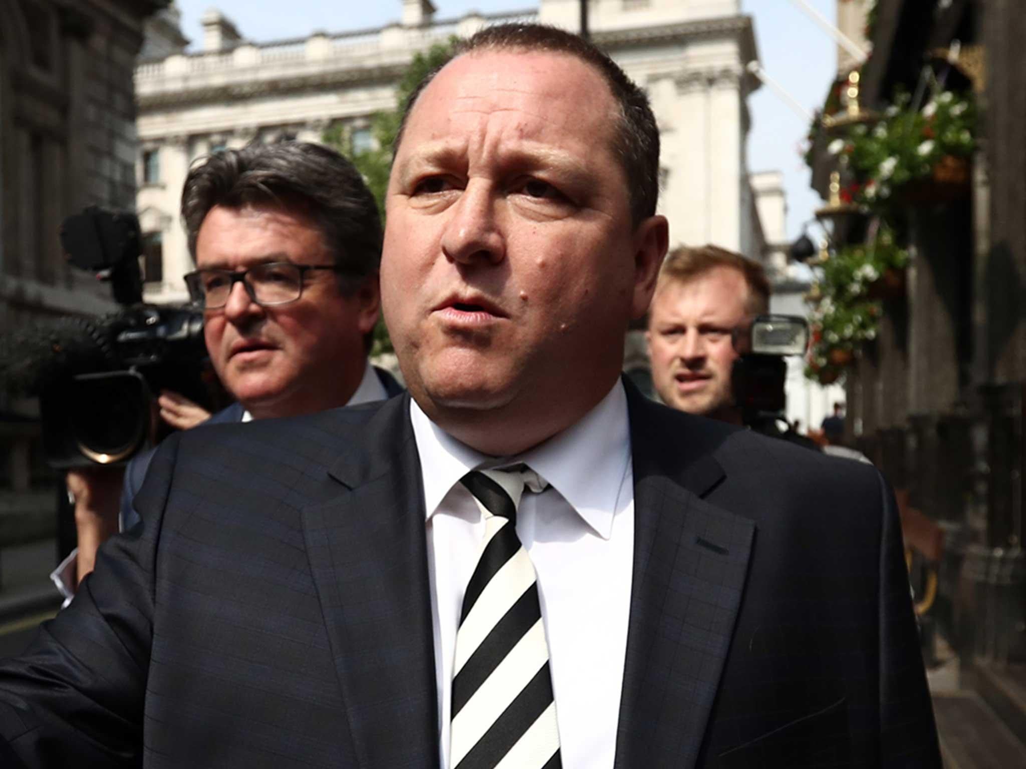 Sports Direct International founder Mike Ashley leaves the Red Lion pub in Westminster to attend a select committee hearing at Portcullis house in London