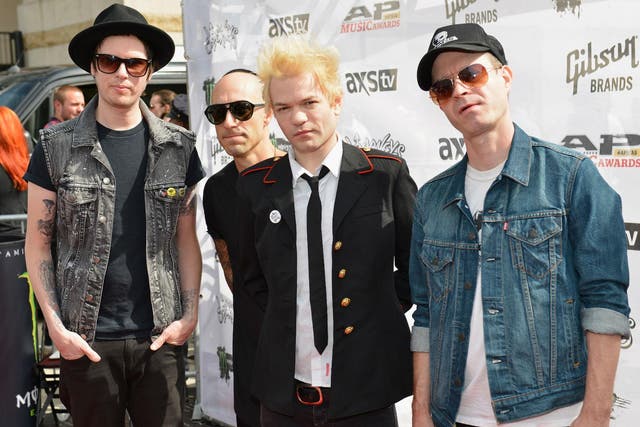 (L-R) Cone McCaslin, Frank Zummo, Deryck Whibley, and Tom Thacker of Sum 41 in 2015