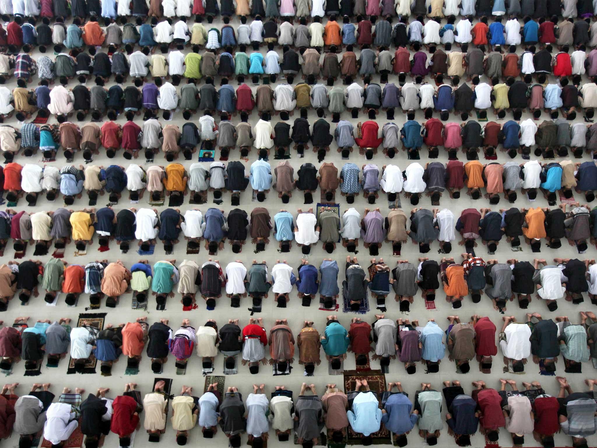 Students perform a prayer on the first day of the holy fasting month of Ramadan at Ar-Raudlatul Hasanah Islamic boarding school in Medan, North Sumatra, Indonesia. During Ramadan, the holiest month in Islamic calendar, Muslims refrain from eating, drinking, smoking and sex from dawn to dusk