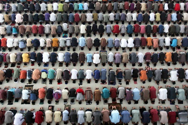 Students perform a prayer on the first day of the holy fasting month of Ramadan at Ar-Raudlatul Hasanah Islamic boarding school in Medan, North Sumatra, Indonesia. During Ramadan, the holiest month in Islamic calendar, Muslims refrain from eating, drinking, smoking and sex from dawn to dusk