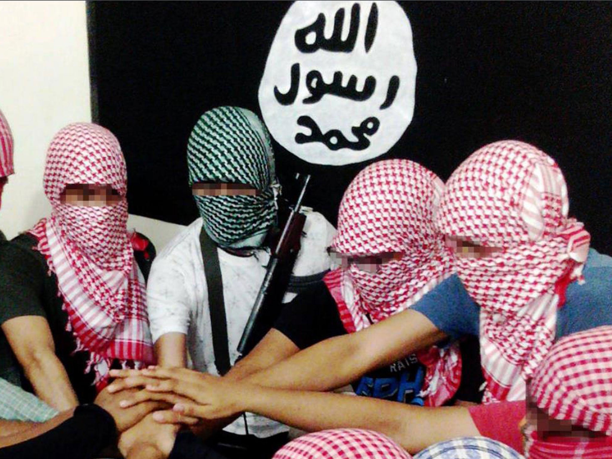 Isis released this image, saying the militants pictured were based in Bangladesh, which it calls its ‘Bengal’ province