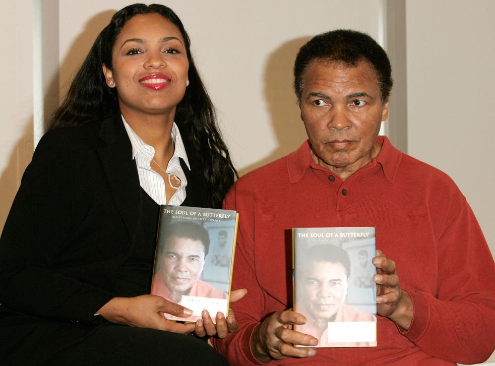 Muhammad Ali and his daughter, Hana Yasmeen Ali, make an appearance at Barnes and Noble to meet fans and to promote his new book, 'The Soul of a Butterfly' on 2 December, 2004 in New York City