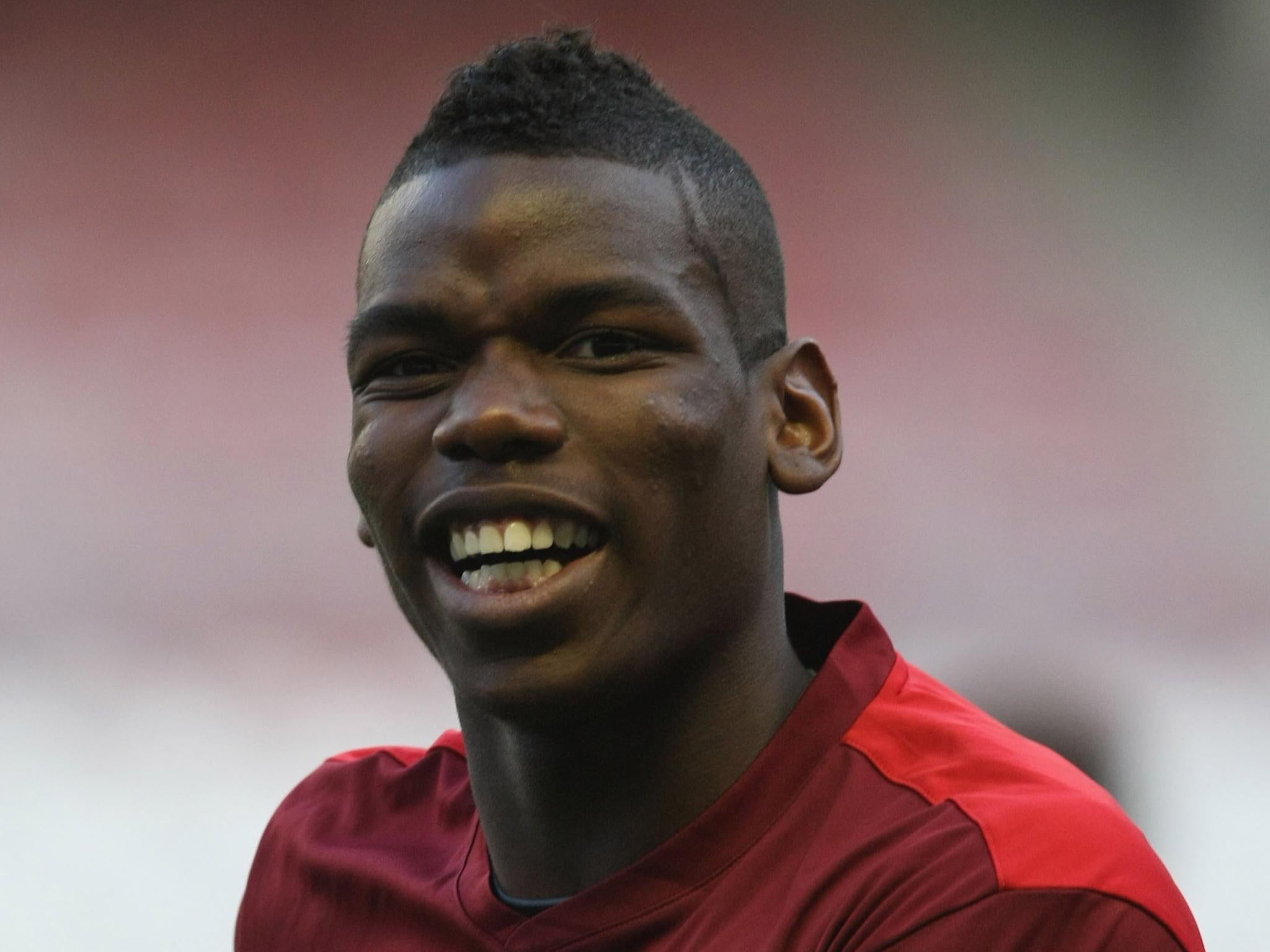 Pogba, pictured during a Manchester United training session in 2012