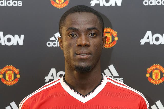 Eric Bailly poses following his £30m transfer to Manchester United