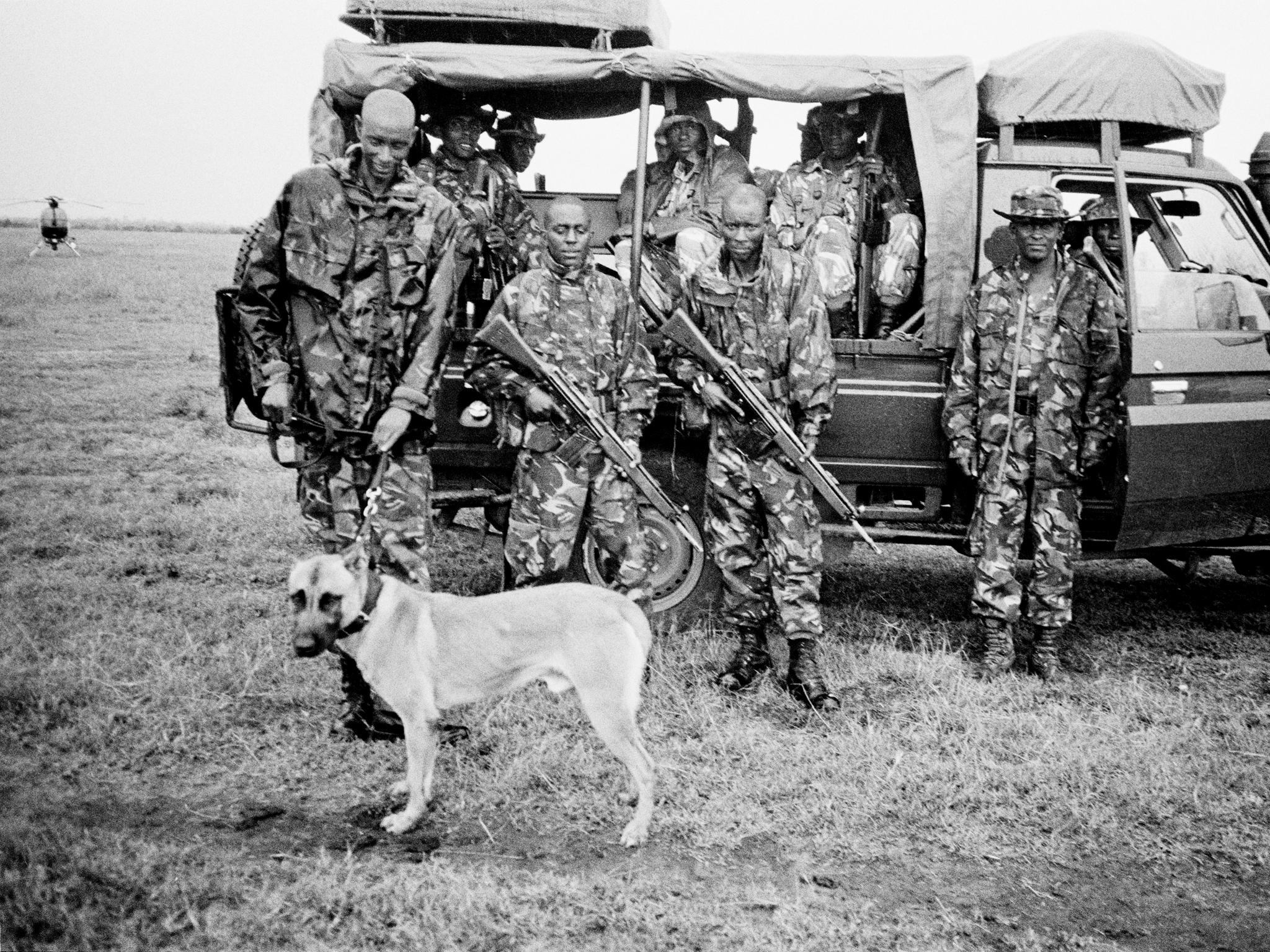 A unit from one of the dog teams supported by Space for Giants in Kenya waits to demonstrate their operational skills to the attending delegates. More than 150 delegates attended in total and were shown a range of conservation activities and approaches by experts.