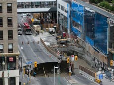 Massive sinkhole engulfs street and causes gas leak in Canada's capital, Ottawa