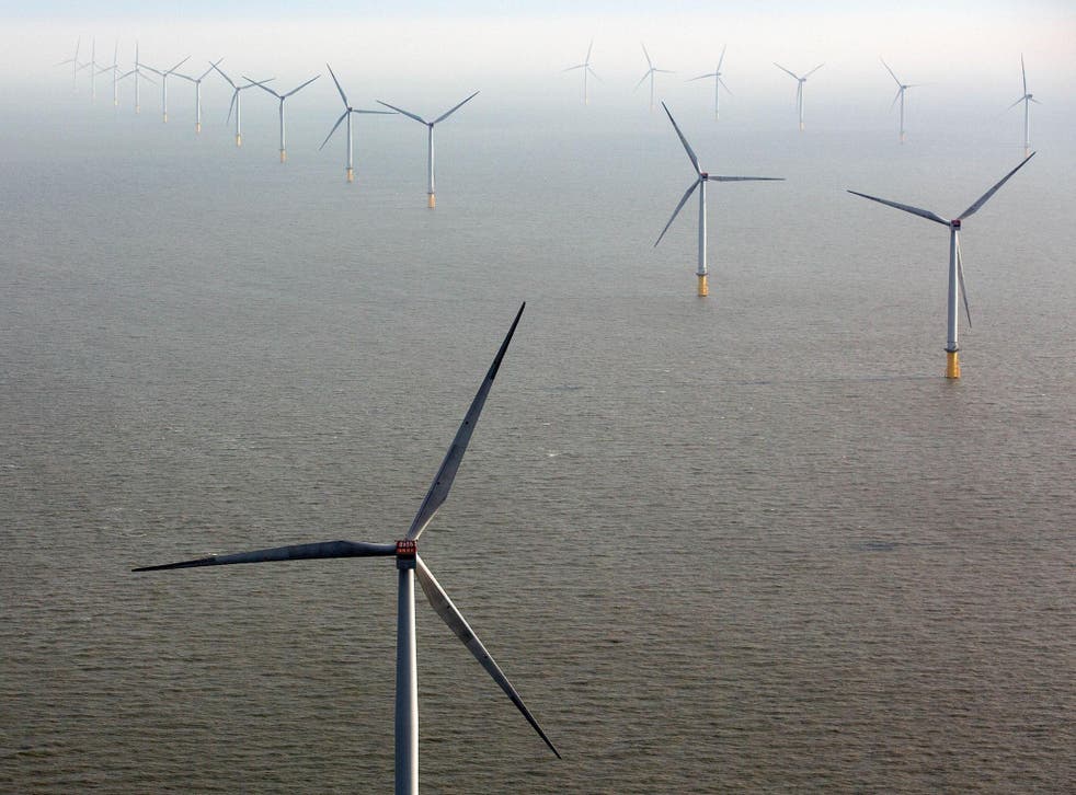 Wind turbines sit in the North Sea at the London Array offshore wind farm, a partnership between Dong Energy A/S, E.ON AG and Abu Dhabi-based Masdar