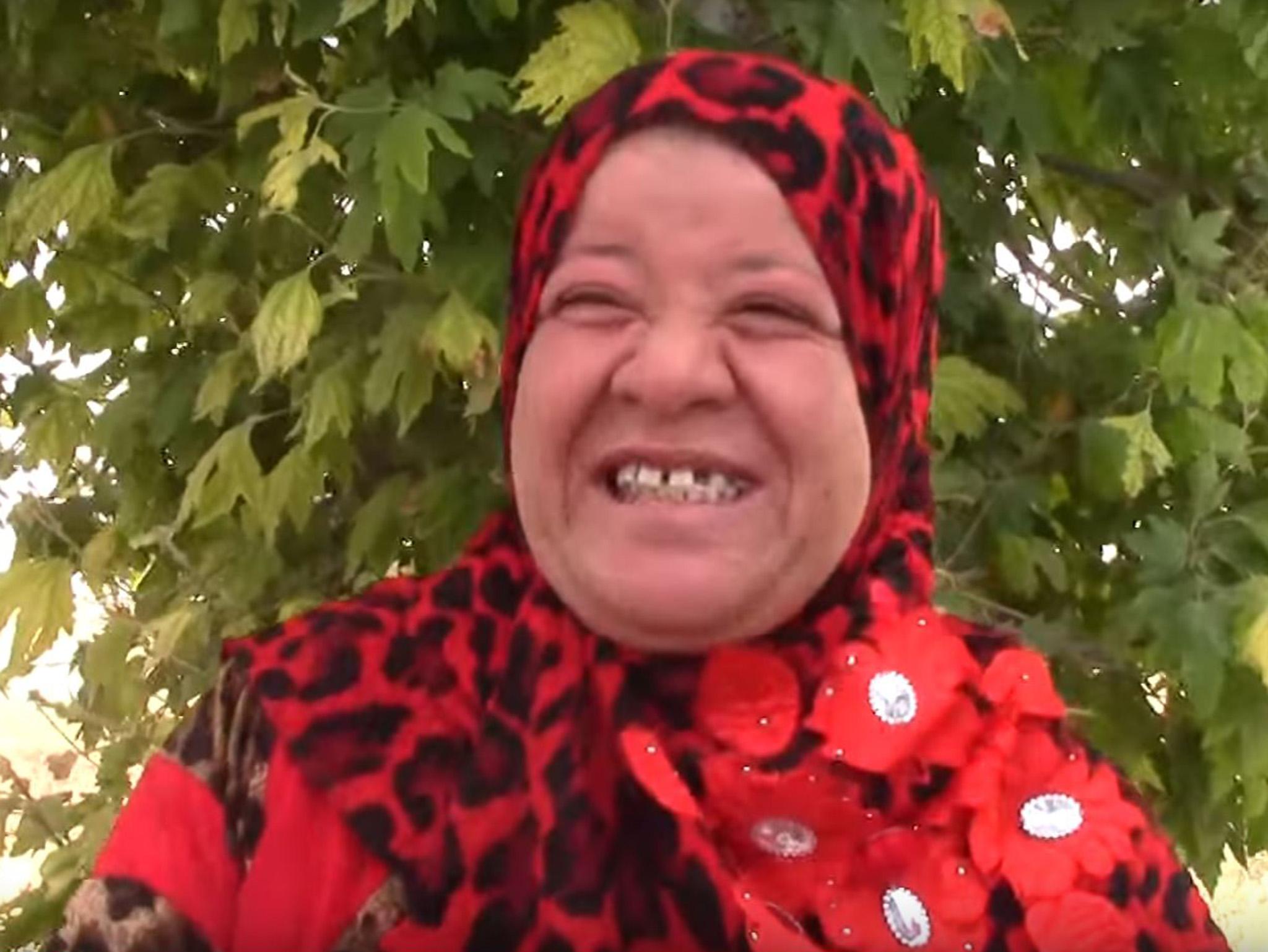 Khadija Abdu Al-Muotee is celebrating her freedom by wearing red clothes