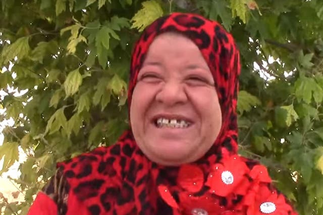 Khadija Abdu Al-Muotee is celebrating her freedom by wearing red clothes