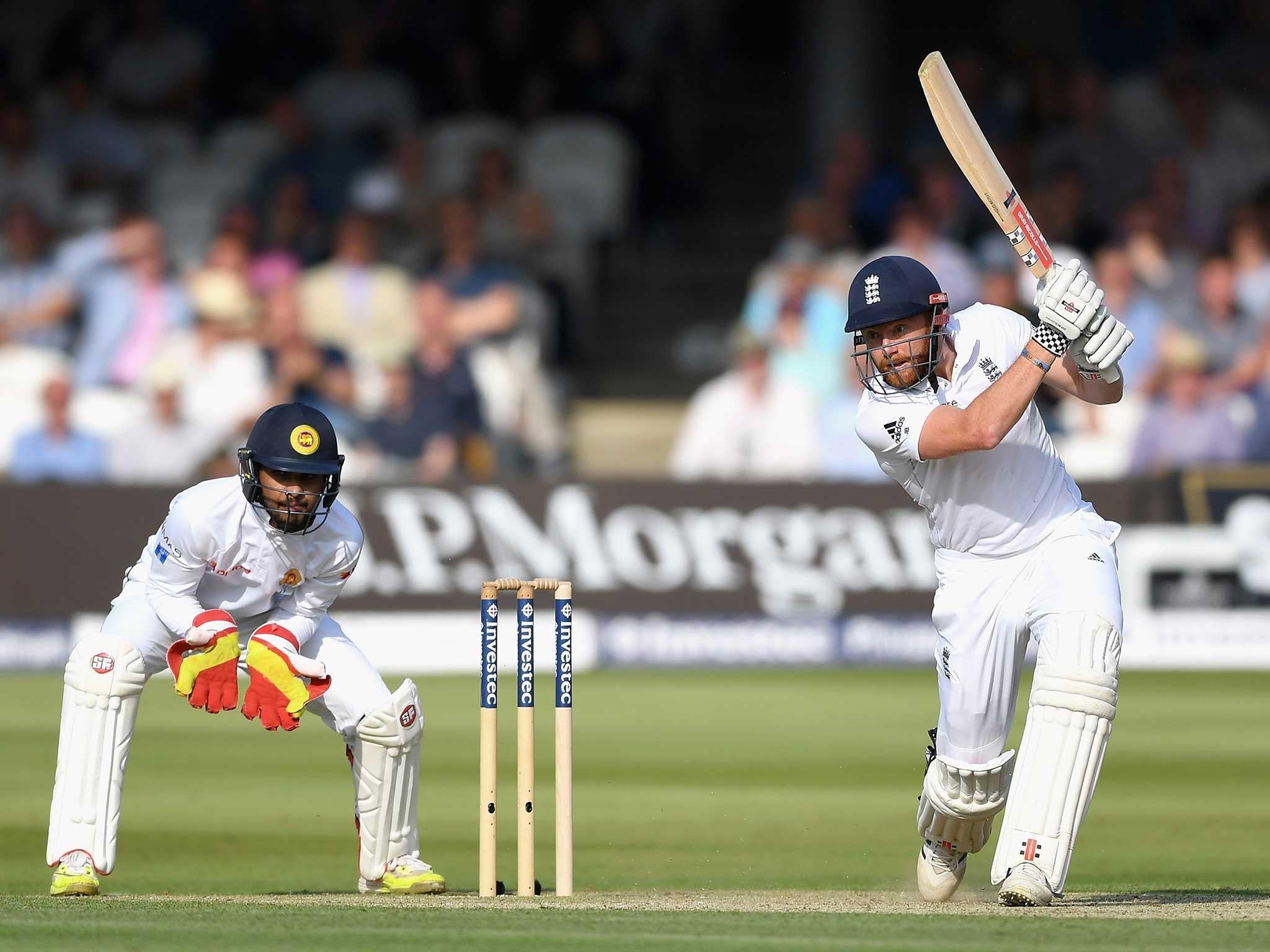 Jonny Bairstow opens the shoulders on the way to his hundred at Lord's