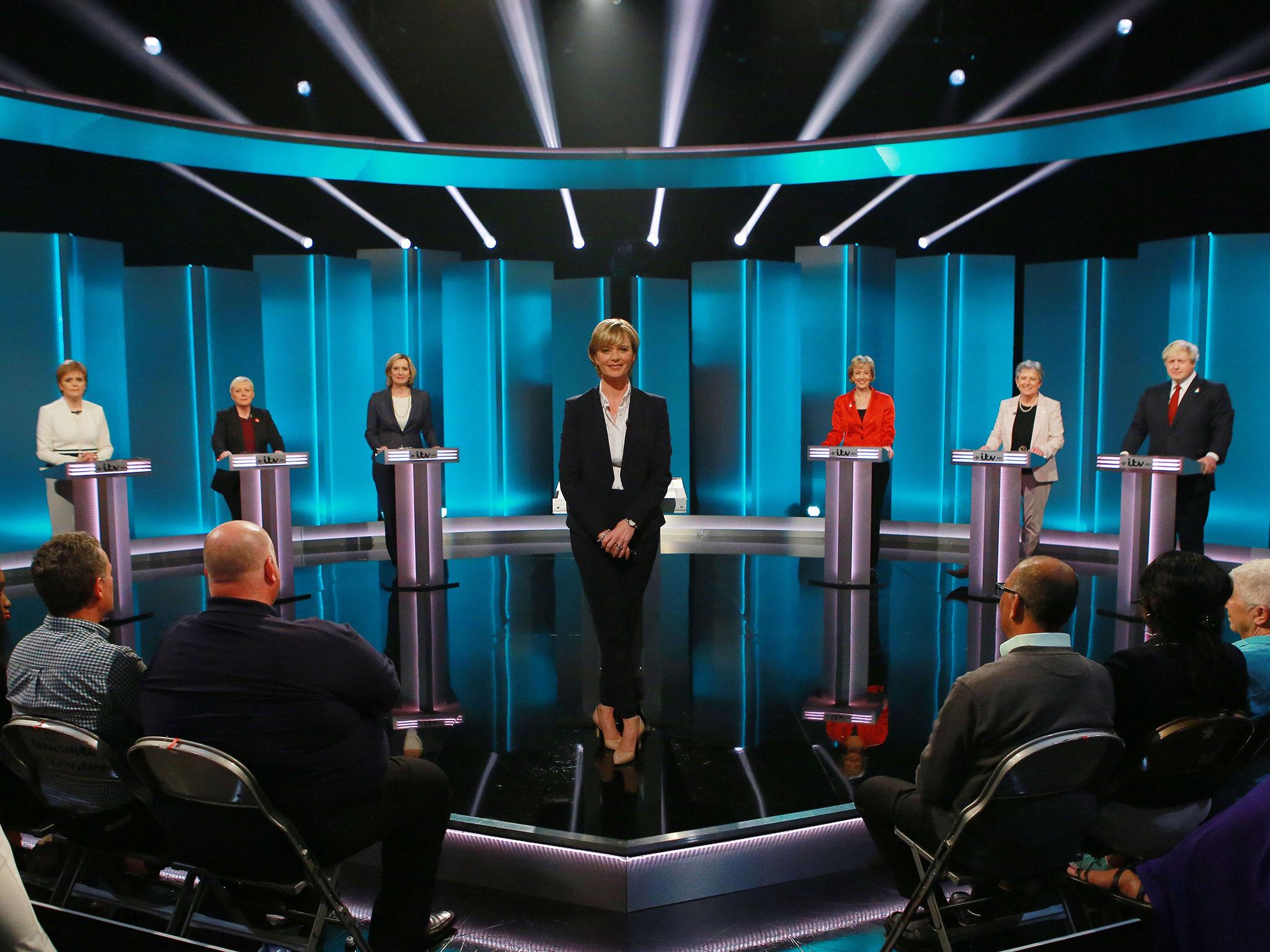 (L-R) Nicola Sturgeon, Angela Eagle, Amber Rudd, Julie Etchingham, Andrea Leadsom, Gisela Stuart and Boris Johnson prepare to do battle in the ITV Referendum Debate