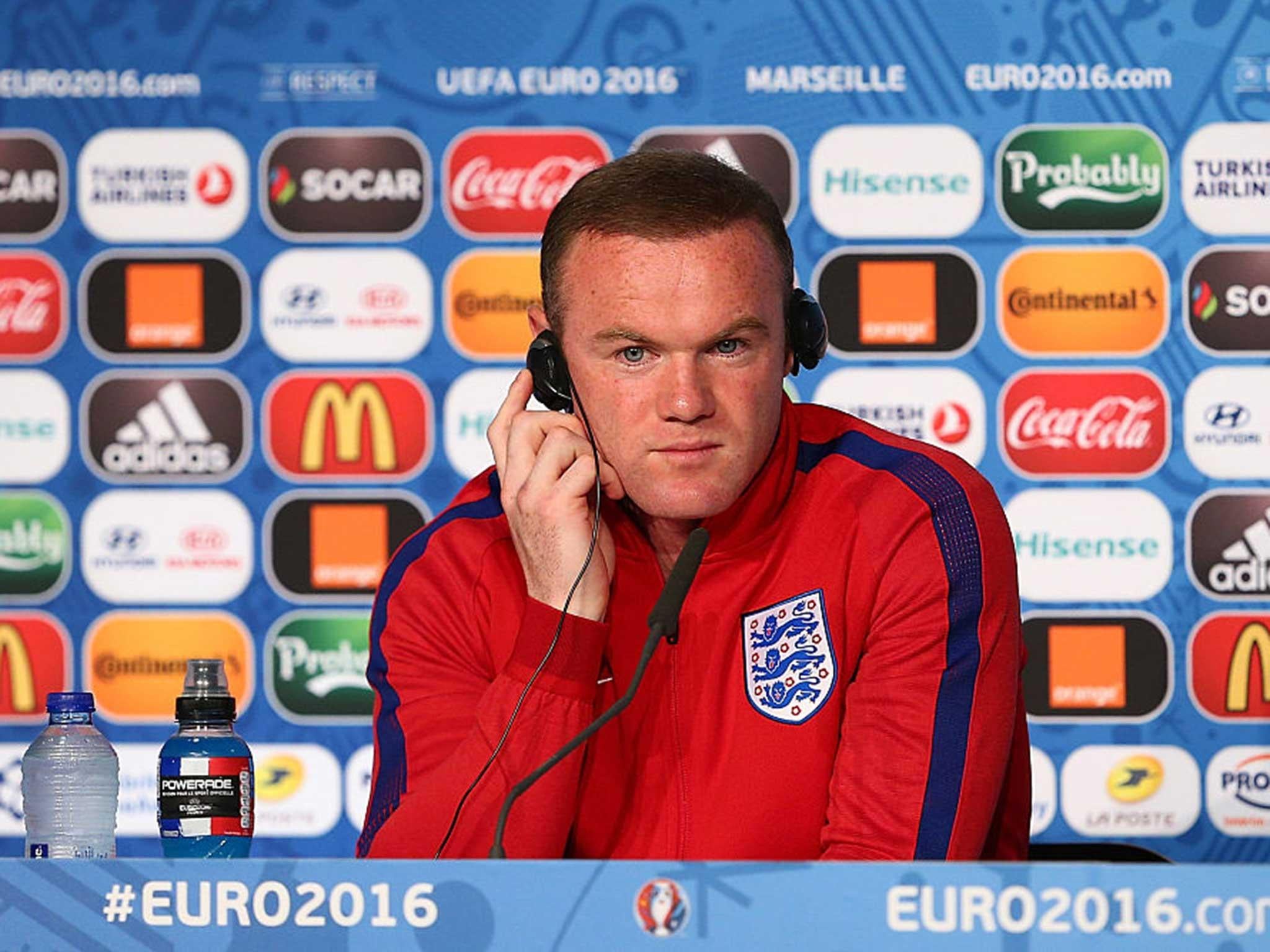Wayne Rooney handles questions from the English - and Russian - media