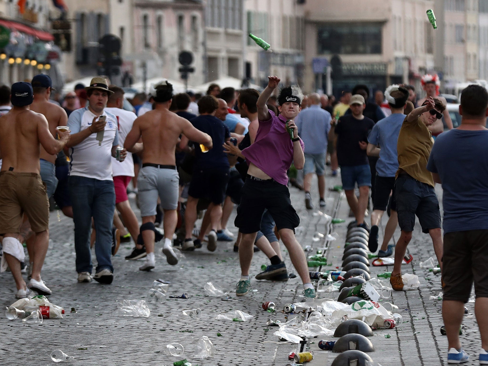 England fans throw bottles at police in Marseille